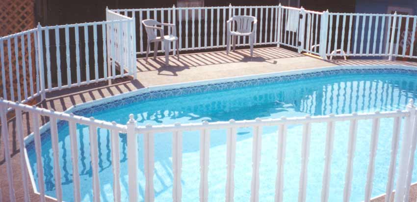 Oval Buster Crabbe Pool with Full Side Deck and Walk around Deck